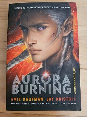 3/$15 book Aurora Burning by Amie Kaufman and Jay Kristoff